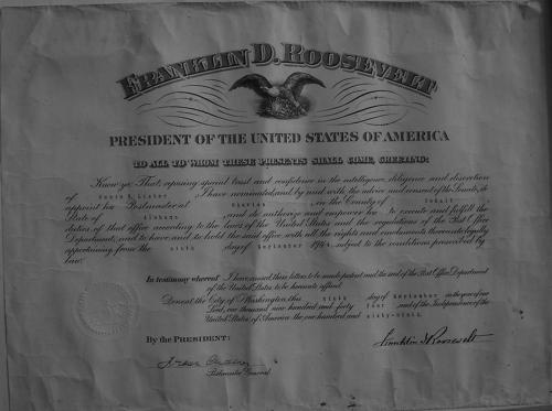 Postmistress Lister's 1944 certificate of appointment from President Roosevelt